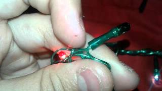 Картинка: ремонт гирлянды.(новый год не без приключений)